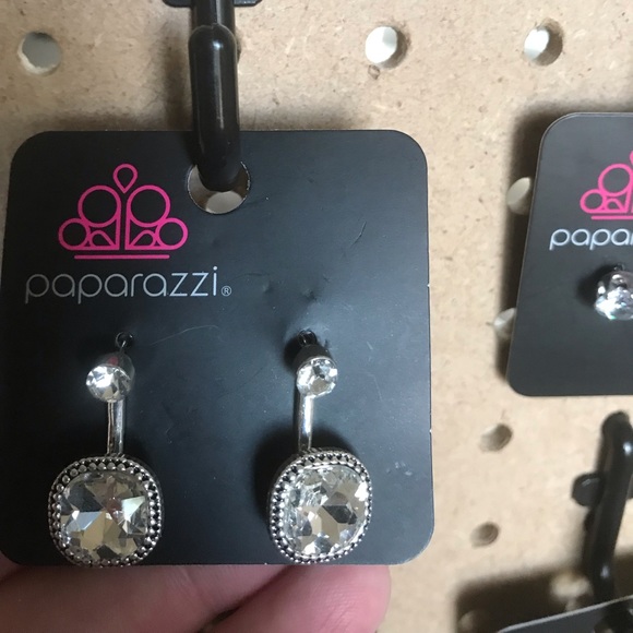 Rounded square crystal jacket earrings.
